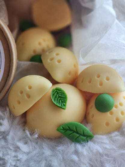 Detalle de los wax melts First Light elaborados con cera 100% vegetal de soja.