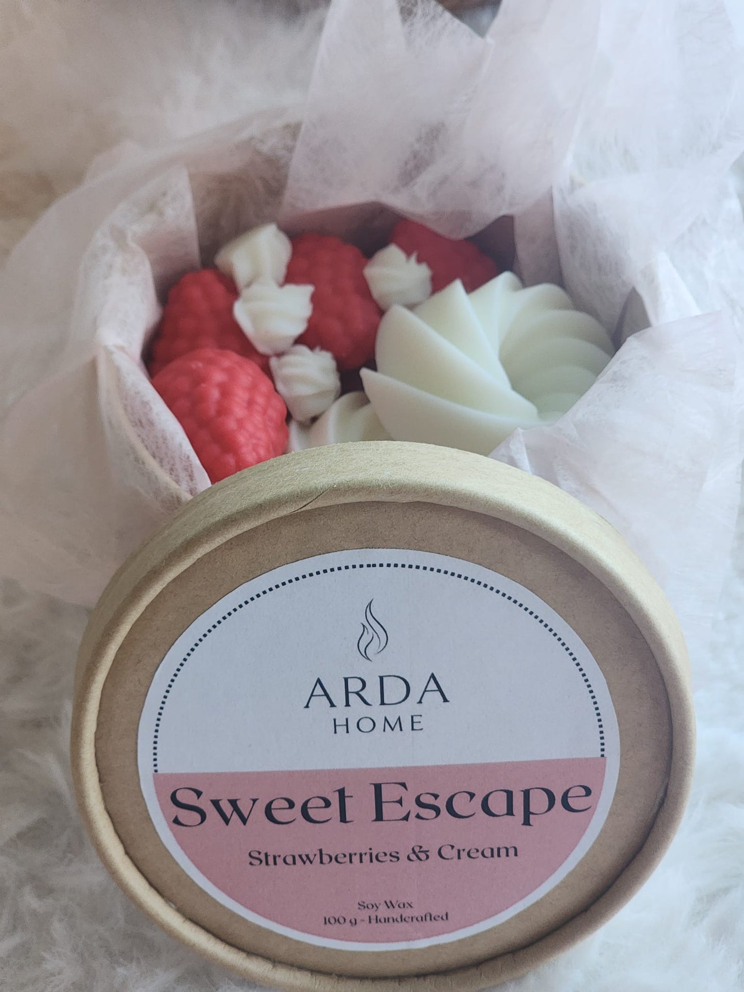 Vista lateral de los wax melts Sweet Escape con aroma a fresas y nata.
